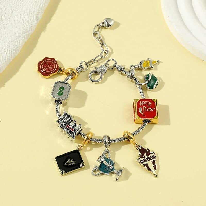 D1E07D25-D3FB-D5DB-553F-1E2553F51595.jpg Pulsera C/ Charms Wizarding - Image 1
