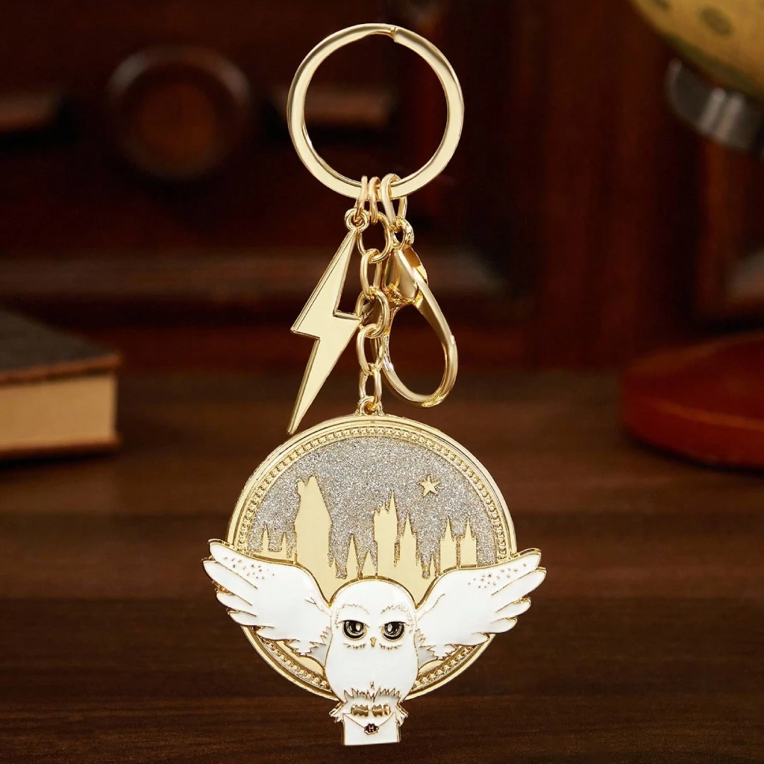 a6cc24d0-6654-4511-9f42-ed22b26fa32b (1) Llavero giratorio Harry Potter Hedwig - Image 1